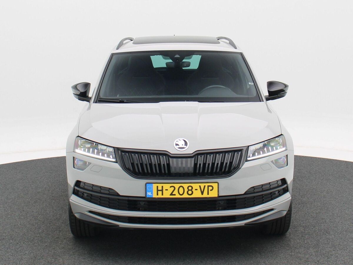 Škoda Karoq 1.5 TSi 150 Pk Automaat Sportline Business | Adaptive Cruise | Climate Control | Panoramadak | Stoelverwarming | Navigatie | Camera | Canton | Carplay | 102.179 Km!!