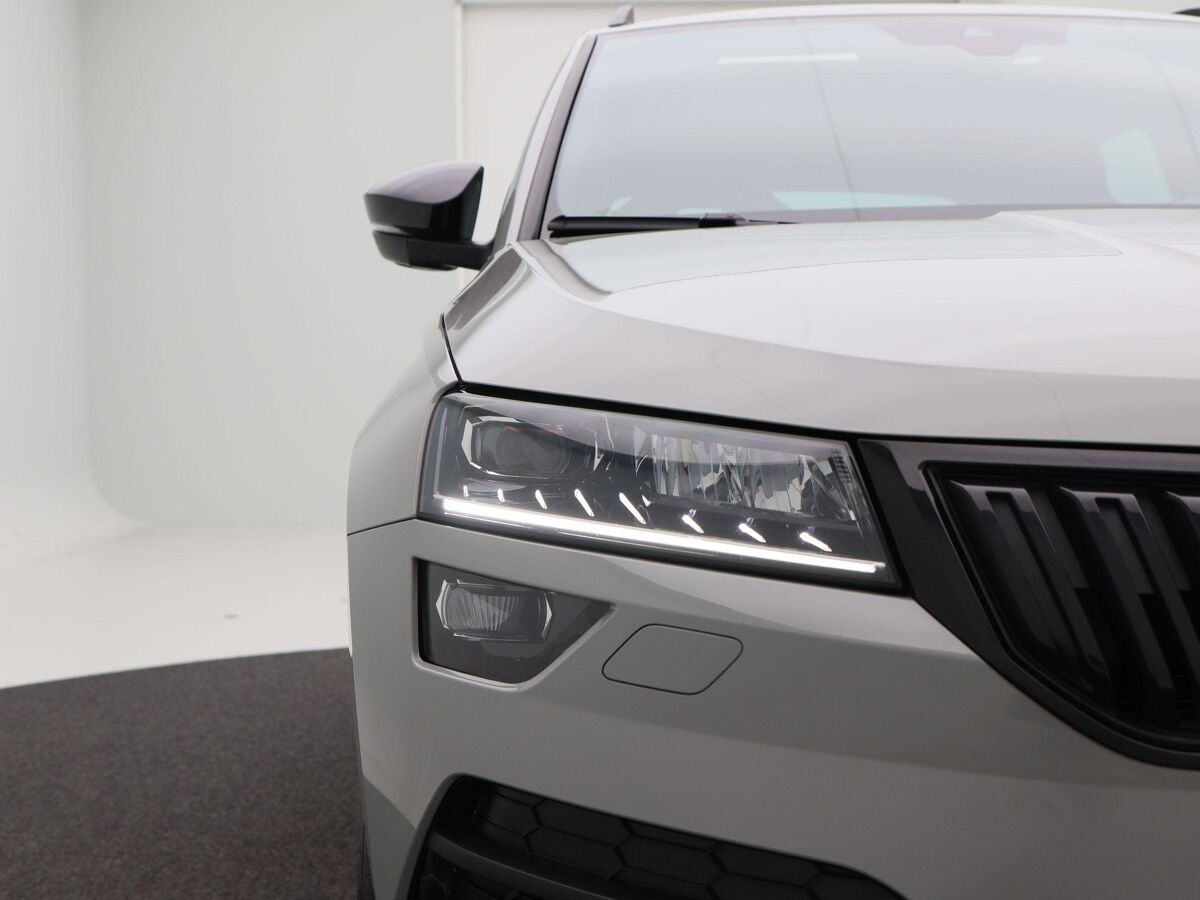Škoda Karoq 1.5 TSi 150 Pk Automaat Sportline Business | Adaptive Cruise | Climate Control | Panoramadak | Stoelverwarming | Navigatie | Camera | Canton | Carplay | 102.179 Km!!