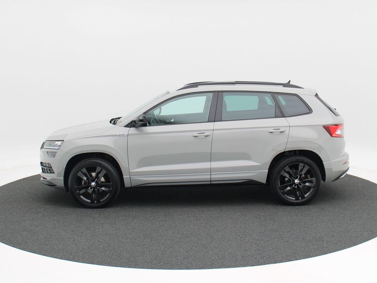 Škoda Karoq 1.5 TSi 150 Pk Automaat Sportline Business | Adaptive Cruise | Climate Control | Panoramadak | Stoelverwarming | Navigatie | Camera | Canton | Carplay | 102.179 Km!!