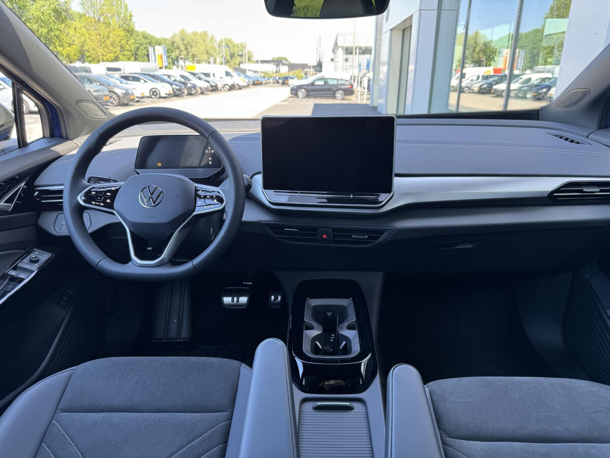Volkswagen ID.4 Pro Limited Edition 77 kWh accu 286 pk | Trekhaak | 20" Velgen | Stoel & Stuurverwarming | Navigatie | Draadloze Telefoonlader | Camera |